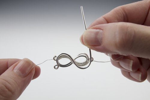 Susan Barzacchini's Infinity Rose Wire Bracelet - Completing the Infinity Frame, Contemporary Wire Jewelry, Coiling, Coiling Wire, Wire Coiling, Flip the infinity to the back 